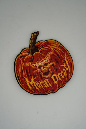 MDP Pumpkin leather morale patch: die-cut jack-o'-lantern with a horned demon skull face and Moral Decay text, full color UV print