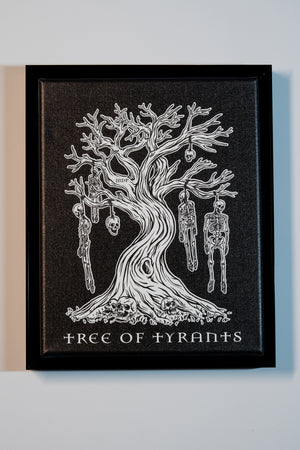 Framed artwork of a tree with branches shaped like skeletons, titled 'Tree of Tyrants', on a plain background.