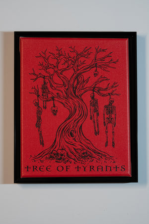 Framed artwork of a tree with hanging skeletons on a red background, titled 'Tree of Tyrants'.